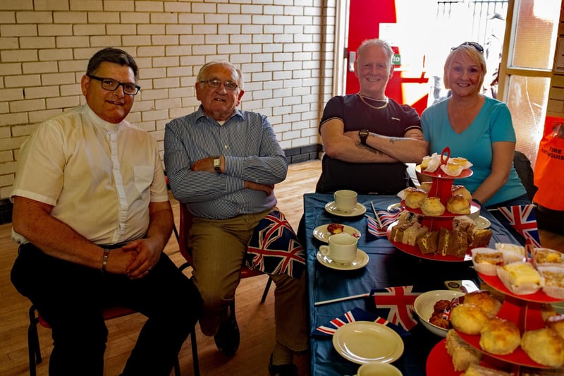 Having a great time at the tea party are from left, Rev Philip Evans, Cedric Law, Noel Lyness and Vivien Dean. LM19-201.