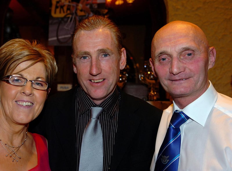 Former world No 1 cyclist Sean Kelly who was special guest at the RT Autoparts East Tyrone CC 60th anniversary presentation dinner in 2007 pictured with club chairman Rod Davidson and his wife Ann.