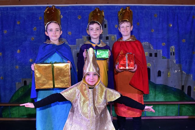 The three kings played by from left, Daniel, Seth and Rowan and the star played by Rebecca in the Hamiltonsbawn Primary School nativity play, A Twinkly Christmas. PT50-703.