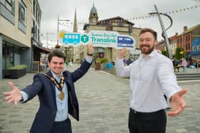 Mayor of Lisburn and Castlereagh City Council, Cllr Kurtis Dickson, pictured with Paul Loughran, Assistant Service Delivery Manager, Translink at Lisburn's Market Square. Pic credit: Aaron McCracken