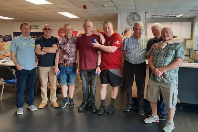 Some of the bowlers at the HIM (Health in Mind) Men's Group at The Fitzone Foundation in Craigavon, Co Armagh with co-founder of Fitzone Sean Collins who is also a Support Worker for the Southern Health and Social Care Trust.