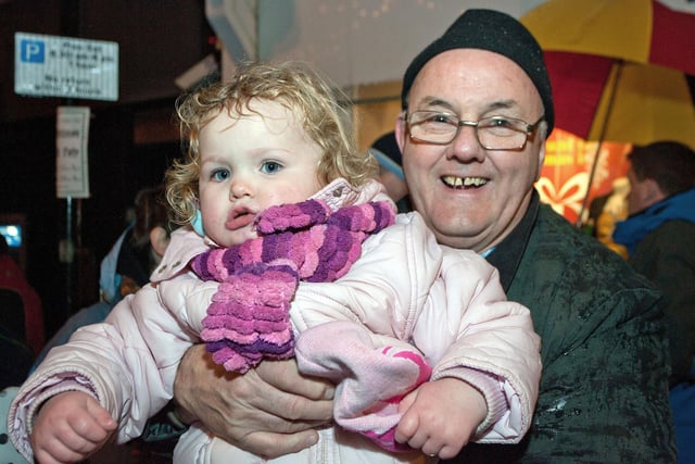 Little Rhiana Finney and Boyd Ramsay smile for the Times at the Christmas Lights Switch on in Ballymoney in November 2010