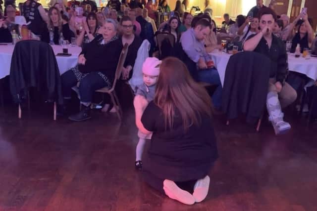 ​Rachel having a ball, dancing with mum, Katie.