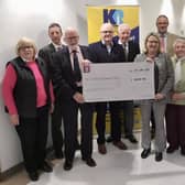Members of Northern Ireland Kidney Research Fund and Dromore and District Male Voice Choir at a presentation of a cheque for £1505.92 to Northern Ireland Kidney Research Fund as a result of the offering at a praise service with joint choirs of Ballymoney and District, Queens Island Victoria, and Dromore and District Male Voice Choirs.
From left:  May Morris, James Smyth, David Thompson, Trevor Kinkaid, Noel Meeke, Susan Kee, Trevor Martin,  Gertrude Jameson, Rev Jim McCaughey and Muriel McCracken.