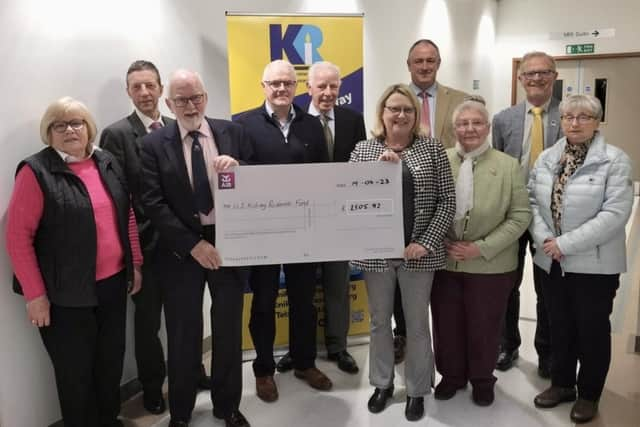 Members of Northern Ireland Kidney Research Fund and Dromore and District Male Voice Choir at a presentation of a cheque for £1505.92 to Northern Ireland Kidney Research Fund as a result of the offering at a praise service with joint choirs of Ballymoney and District, Queens Island Victoria, and Dromore and District Male Voice Choirs.
From left:  May Morris, James Smyth, David Thompson, Trevor Kinkaid, Noel Meeke, Susan Kee, Trevor Martin,  Gertrude Jameson, Rev Jim McCaughey and Muriel McCracken.