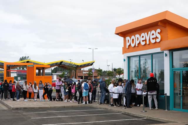 A section of the large queue at the new Popeyes® in Antrim ahead of its opening on Monday morning. Picture: Kelvin Boyes / Press Eye