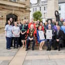 Staff representatives from Northern and Western Health Trusts who have been honoured with the Freedom of the Borough, join Mayor of Causeway Coast and Glens Councillor Steven Callaghan QPM, Jennifer Welsh, Chief Executive of the Northern Trust, Western Trust Chief Executive Neil Guckian OBE, and David Jackson, Chief Executive Causeway Coast and Glens Borough Council.