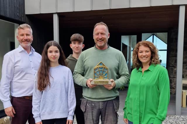Rob, Janice, Tristan and Evie with Kevin and the Home of the Year award.