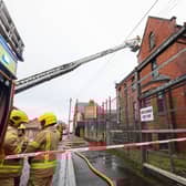 Northern Ireland Fire and Rescue Service (NIFRS) crews at the scene of the fire in Edward Street, Portadown. Picture: Pacemaker Press
