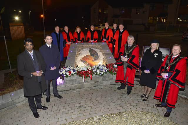 Elected members and dignitaries at a memorial service at the Holocaust Memorial in Monkstown in 2022. (Pic: Antrim and Newtownabbey Borough Council).