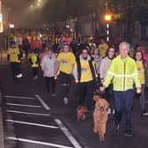 Hundreds of walkers on their way through Cookstown in the early morning Darkness into Light Walk organised by The Hub, Cookstown.