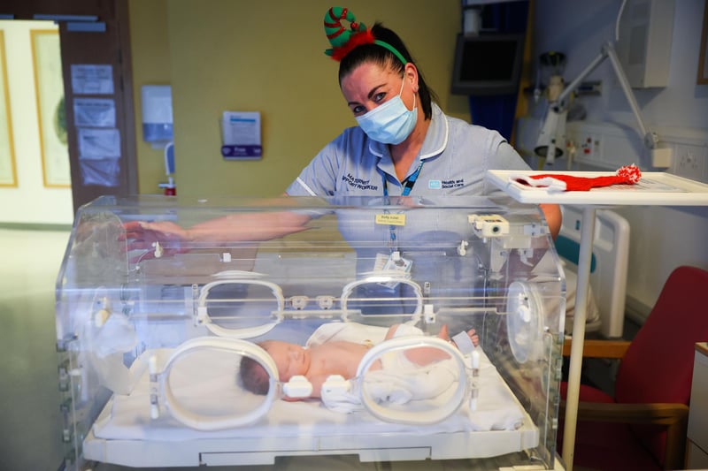 Nurse Kelly Adair at the Ulster Hospital, Dundonald with baby boy Elliott from Newtownards who weighed 7lb 2oz and was born at 12.29 on Christmas Day. Picture: Kelvin Boyes / Press Eye.