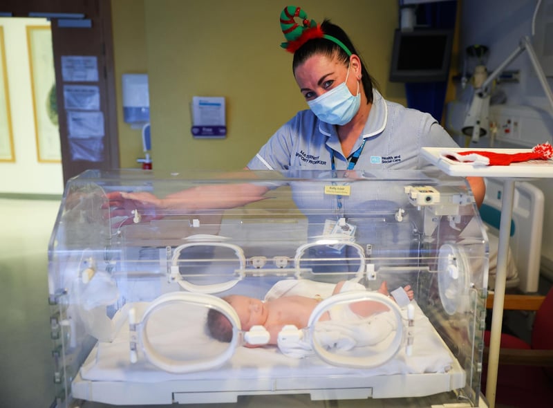 Nurse Kelly Adair at the Ulster Hospital, Dundonald with baby boy Elliott from Newtownards who weighed 7lb 2oz and was born at 12.29 on Christmas Day. Picture: Kelvin Boyes / Press Eye.