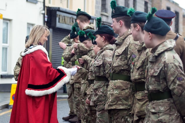Lord Mayor of ABC Council, Alderman Margaret Tinsley presents sprigs of shamrock to local Army Cadets before the RBL St Patrick's Day parade on Saturday. PT12-204.