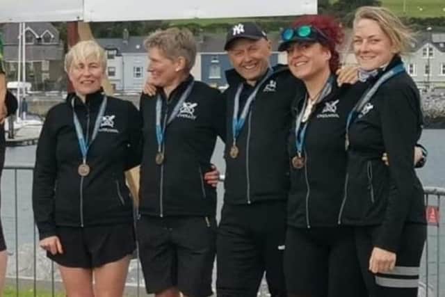 Bronze medal-winning Women’s Veteran crew, left to right: Caitriona Hudson, Beverly Gaston, Michael Millar (cox), Lheanna Kent and Gina Patterson. Photo submitted by Whitehead Rowing Club.
