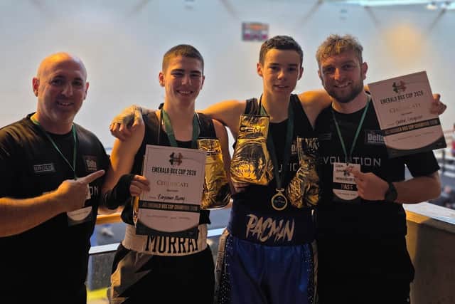 Champions Benjamin Murray and Preston Creighton with coaches Iain Mahood and Arvy Blair.