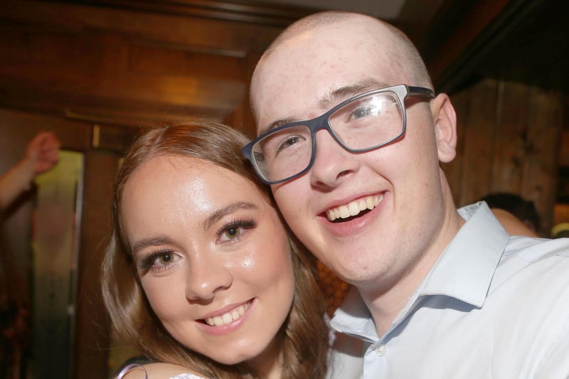 Cathal McDonnell and a friend enjoying  the Brave the Shave fundraiser he organised in memory of his grandfather for Macmillan Unit Antrim held at the central bar in Cushendall on Saturday evening. Credit McAuley Multimedia