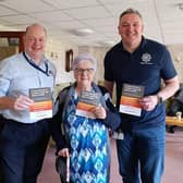 Andrew, Ballymena Rural Warden; a resident of Cullybackey Fold and Paul, PSNI Crime Prevention Officer educate senior citizens on scams.  Photo: MEABC