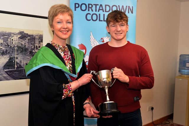 Miss Gibb presents prizes for Sport at Portadown College Prize Day.