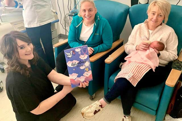 Ulster Hospital’s Neonatal Unit Nurse Nikita Hall with parents Nikita and Laura Johnston and baby daughter Eliza. Pic credit: SEHSCT