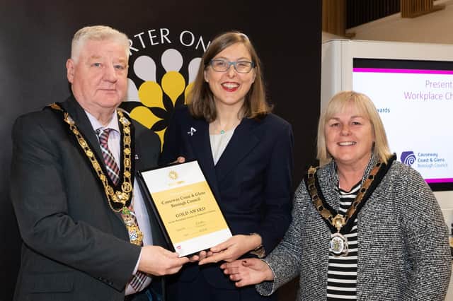 Mayor of Causeway Coast and Glens, Councillor Steven Callaghan, alongside Deputy Mayor Councillor Margaret-Anne McKillop as the Mayor accepts the Gold Workplace Charter for Council at the Onus Awards 2023. Credit CCGBC