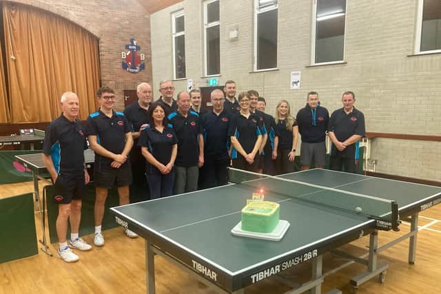 Leader Joe Crawford, left, and fellow members prepare to celebrate 60 years since Legacurry Table Tennis Club was formed in the old church hall. Pic credit: Rodney Magowan