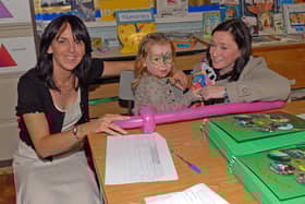 Mrs Marie McGrath, principal of St Patrick's Primary School, Magheralin chats with Mrs Carrie Duffy and daughter Lily-Rose at the open night in 2011.