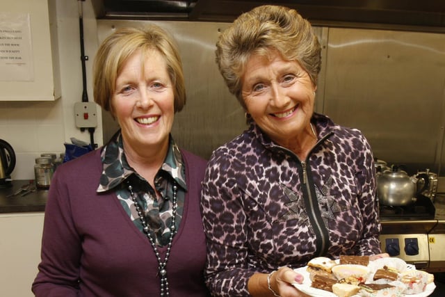 Joan McCallum and Joy Kearney helping in the kitchen at the Save The Children Fashion Show at Coleraine Rugby Club back in October 2009