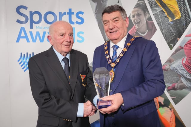 The Mayor, Alderman Noel Williams, presents the Services to Sport award to Terry Windsor for sailing.