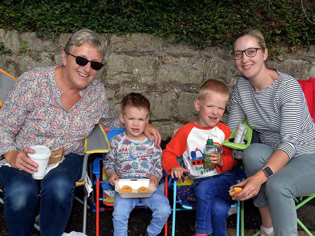Waiting patiently for the RBP Last Saturday parade in Loughgall are, Nicola Wilson, her grandsons Xander Cartmill (4), Jamie Cartmill (5) and their mum, Lisa. TH10.