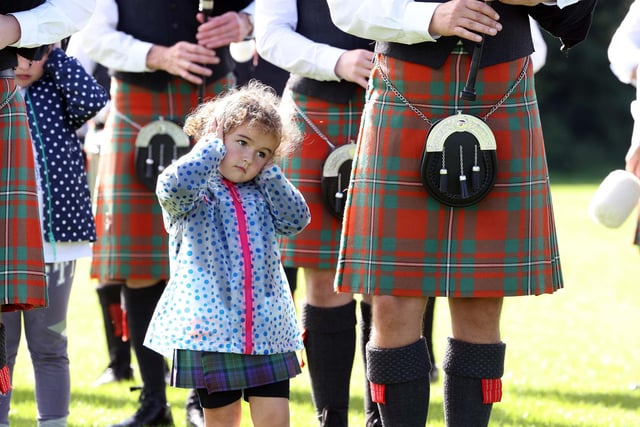 This little girl isn't sure whether she likes the sounds at the Ulster Pipe Band and Drum Major Championships on Saturday.