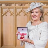 Kathleen O'Hare received an OBE from Princess Anne for services to education.