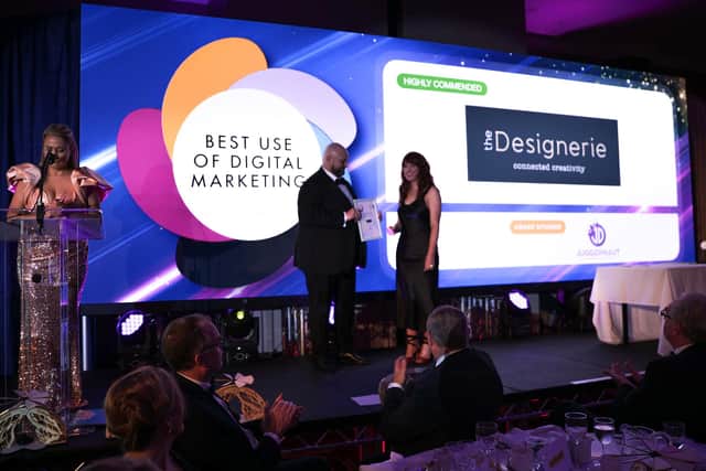 Zoe Jones, Store Manager of The Designerie, Bushmills, accepts the highly commended award for Best use of Digital Marketing on behalf of the social enterprise