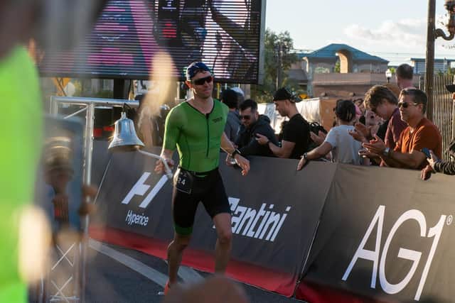 Simon Logan finishing the Ironman event. Credit: Submitted