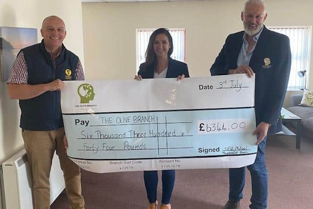 Pictured at the cheque presentation are, from left, Richard Campbell, Leoné Neill & Alan Mulholland. Credit: NFU Mutal