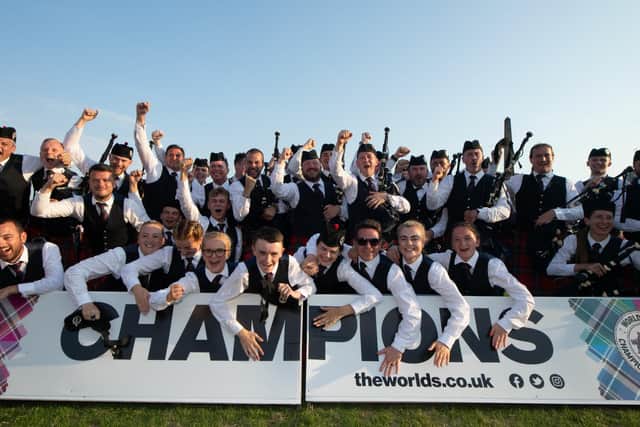 Field Marshal Montgomery Pipe Band celebrate winning the World Pipe Band Championships at Glasgow Green, on August 13, 2022, in Glasgow, Scotland. Photo by Ross MacDonald / SNS Group