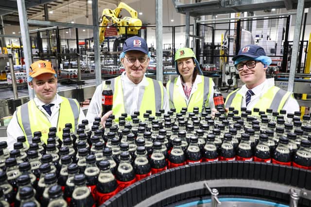 Welcoming Secretary of State of Northern Ireland the Coca-Cola HBC production facility in Lisburn, Country Plant Manager, Kieran Given, Supply Chain Director, Joanna Sneddon and newly appointed General Manager, Simon Fitzpatrick. Pic credit: William Cherry/Presseye