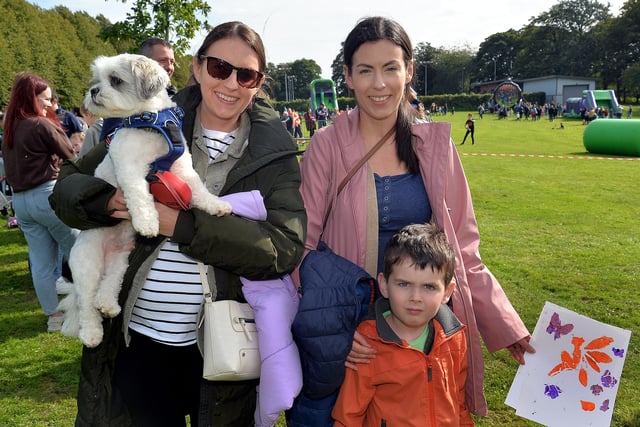 All smiles at the ABC Council Good Relations Week event in Lurgan Park are, from left, Angela Gregg and her dog, 'OTIS', Suzanne Ingram and son Jacob. LM39-226.