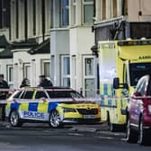 Police at the scene after a man was found with injuries in west Belfast on Wednesday night. He died later in hospital. Picture: Pacemaker