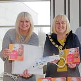 Deputy Mayor Councillor Margaret Ann McKillop joins Council staff Sharon McAfee Head of Health and Built Environment and Nicky Matthews Building Control Manager to promote the Stay Warm Stay Safe Campaign. Credit Causeway Coast and Glens Council