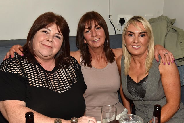 Enjoying the party atmosphere are, from left, Shauna Mulholland, Anne Bailey and Cliona Larkin. PT19-235.