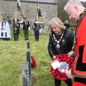 Mayor Steven Callaghan and Deputy Mayor Margaret Ann McKillop lays a wreath on Rathlin Island on Sunday.