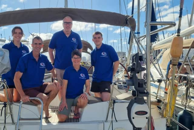 Michael Browne (centre) pictured with other members of Ballyronan Boat Club during their trip across the Atlantic.