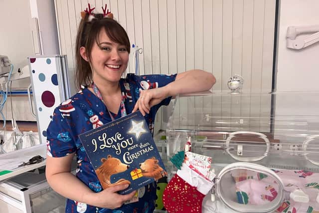 Nikita Harron (Neonatal Nurse) with some of the gifts and decorations the nurses shared in the Ulster Hospital Neo Natal Unit. Pic credit: SEHSCT