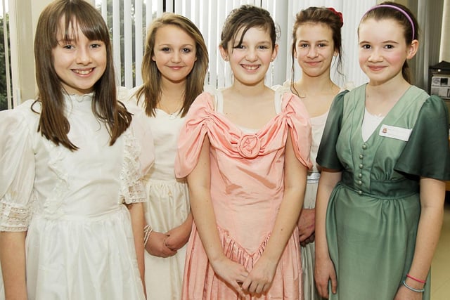 Stacey Burns, Holly Dickinson, Victoria Halley, Rhiannon Gilmore and Emily Henay, who were studying Shakespeare's Macbeth, dressed in Elizabethan costumes for the Wallace High School open day in 2011