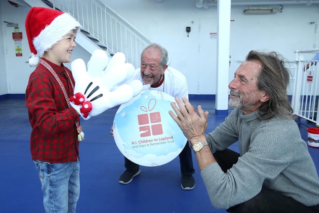 Robbie Lennox from Donaghadee with Raymond Pollock (Coleraine) and Willie Gregg (Portrush) from the North Coast Fundraising Committee for the Northern Ireland Children to Lapland and Days to Remember Trust.