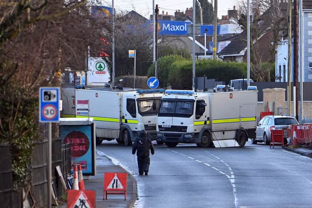 PSNI and ATO officers at the scene of yesterday's security alert in the Antrim Road area of Newtownabbey. (Pic by Press Eye).