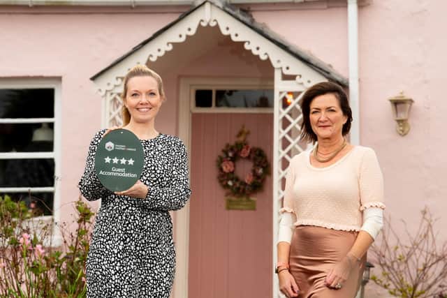 Suzi McIlhatton, Accommodation Certification Manager at Tourism NI and Heather Craig, owner of The Pink Cottage, Whitehead.  Photo: Andrew Towe
