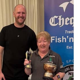 Valerie Taggart who became the Northern Ireland individual pool champion for the 20th time, pictured receiving her award from Aaron McCorkell from Chequers (main sponsors).