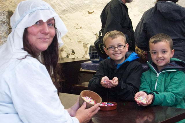 Daniel and Peter Devenney doing arts & crafts with Alison McGrenaghan, 2014. INCT 32-408-RM